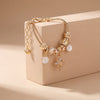 Aestify™ Crystal Bloom Charm Bracelet – 18K Gold Tone